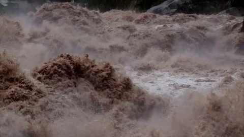 Slow motion shot of Urubamba River in full flood, Peru Stock Footage 77260849