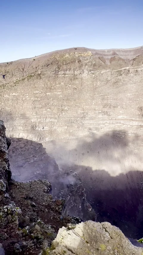 Slow motion shot of volcanic smoke rising against a clear blue sky in Naples Stock-Footage 319601778