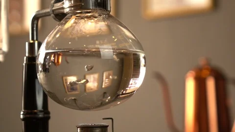 Slow motion shot: Water boiling in glass carafe Stock Footage 104651459