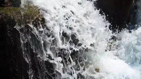 Slow motion shot of water fall splashes in hilly area of Pakistan. (5) Stock Footage 200756503