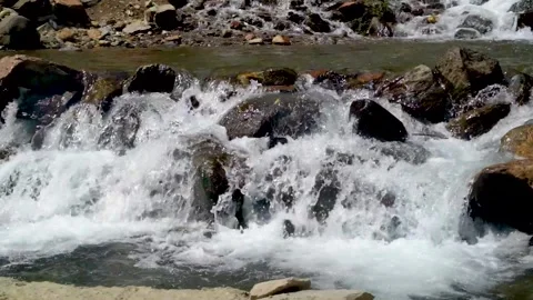 Slow motion shot of water fall splashes in hilly area of Pakistan. (11) Stock Footage 200757080