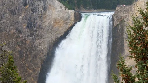 Slow motion shot water falling off Upper Yellowstone Falls Stock Footage 98526044
