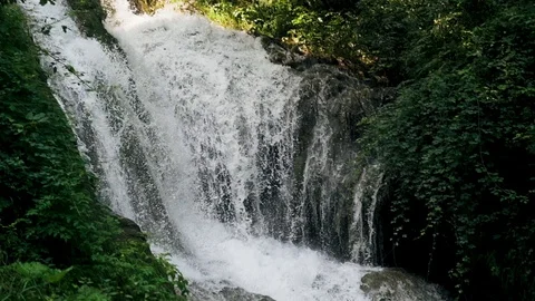 Slow motion shot of water falling down in beautiful italian villa in Tivoli Stock Footage 107822915