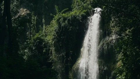 Slow motion shot of water falling down in beautiful italian villa in Tivoli Stock Footage 107823135