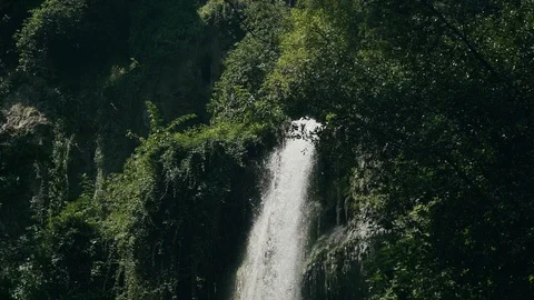 Slow motion shot of water falling down in beautiful italian villa in Tivoli Stock Footage 107823358