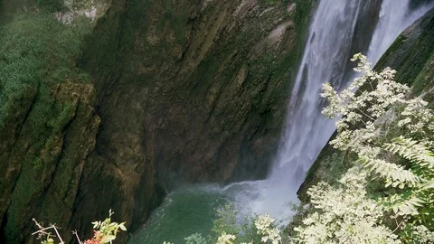 Slow motion shot of water falling down in beautiful italian villa in Tivoli Stock Footage 107824221