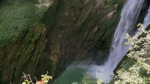 Slow motion shot of water falling down in beautiful italian villa in Tivoli Stock Footage 107824421