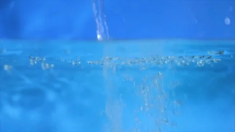 Slow motion shot of water pouring.Full hd video Stockbeeldmateriaal 83872277