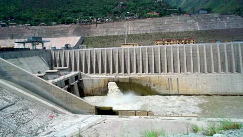 Slow motion shot of water splashes from dam in hilly area of Pakistan. Stock Footage 200758770