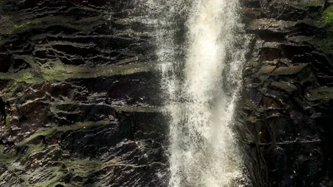 Slow motion shot of a waterfall from above Stock Footage 224960706