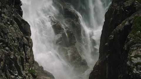 Slow motion shot of waterfall flowing down the rock. Stock Footage 114296664