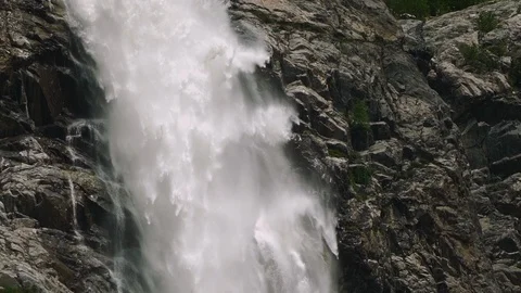 Slow motion shot of waterfall flowing down the rock. Stock Footage 114481343