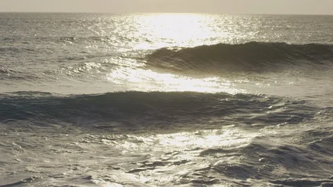 Slow motion shot of waves and sunset. Stock Footage 101409535