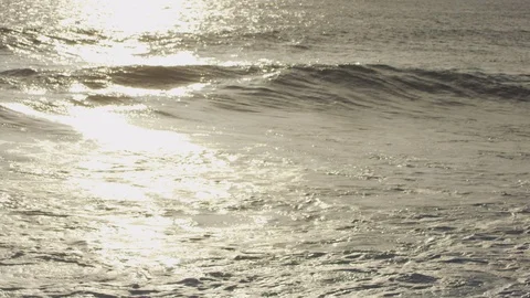Slow motion shot of waves and sunset. Stock Footage 101409575