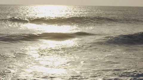 Slow motion shot of waves and sunset. Stock Footage 101409603