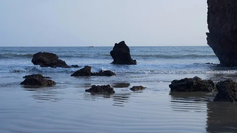 Slow motion shot of waves on a beach Stock Footage 105447893