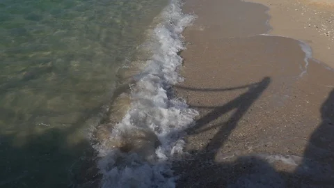 Slow motion shot of waves hitting the shore at Kite Beach, Dubai Stock Footage 123892727