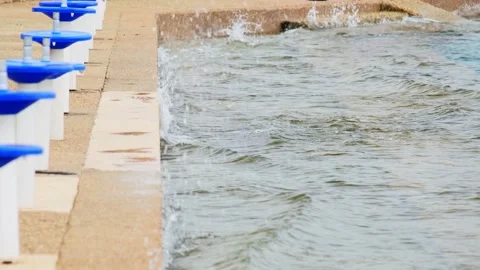 Slow motion shot: Waves of the sea hit the concrete of the beach. Adriatic sea Stock Footage 132014927