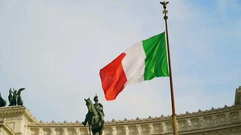 Slow motion shot of waving flag of Italy on Vittorio Emanuele palace background Stock Footage 107827343
