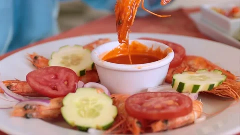 Slow Motion Shrimp dunkend in red salsa mexican seafood delicios Stock Footage 155024834