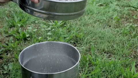 Slow motion sifting ashes Stock Footage 71194843