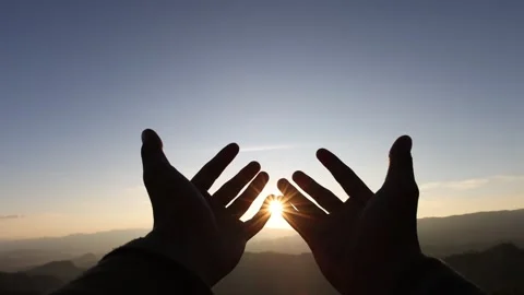 Slow motion silhouette of Human hands open palm up worship. Eucharist Thera.. Stock Footage 336934939