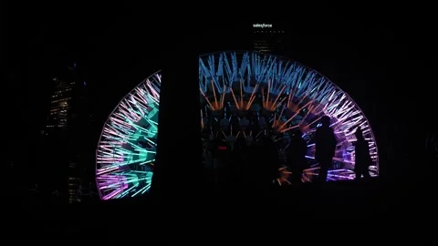 Slow motion Silhouette people in front of colourful neon light 4K Stock Footage 245778484