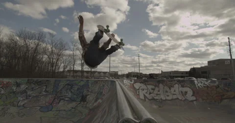 Slow Motion Skateboard Back Flip in Skatepark Stock Footage 33648406