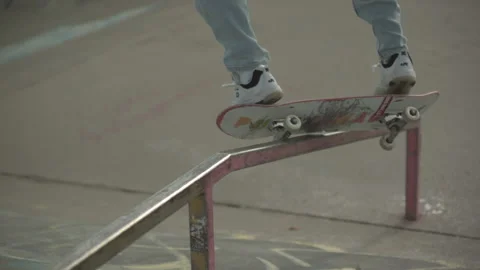 Slow motion skateboard grind on hand rail Stock Footage 142154757
