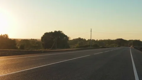 Slow Motion Skateboarder Riding Down Hill At Sunset Stock Footage 79316128