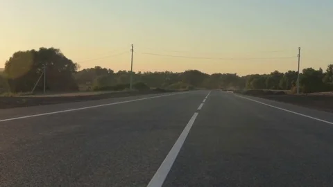 Slow Motion Skateboarder Riding Down Hill At Sunset Stock Footage 79399045