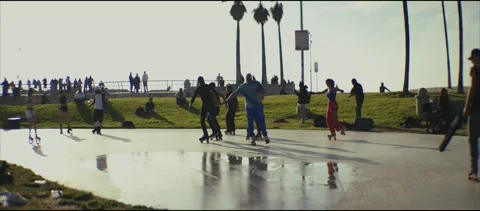 Slow Motion Skaters at Venice Beach Rollerblade Zone and Skate Park LA Stock Footage 306107045