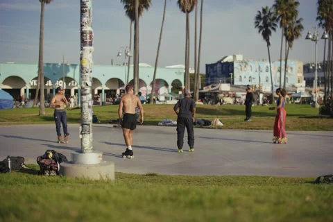 Slow Motion Skaters at Venice Beach Rollerblade Zone and Skate Park LA Stock Footage 306107579