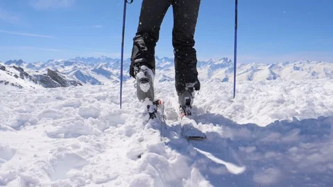 Slow Motion Ski Boots are Inserted Into the Fastening of the Ski and Snap Them Video stock 88402897