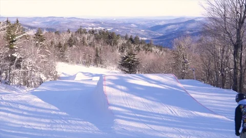 SLOW MOTION Skier Frontflip off Jump in Terrain Park Stock Footage 129457564