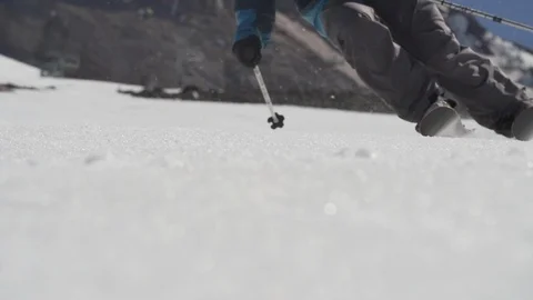 Slow motion skier turning on flexing snow skis Stock Footage 96527531