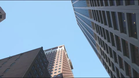 Slow motion of skyscrapers from below Stock Footage 161310820