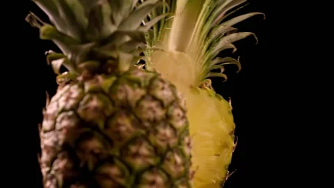 Slow motion of sliced to half pineapple. Close up on fresh sliced pineapple 스톡 동영상 150061679