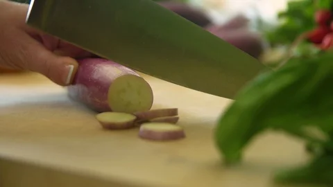 Slow motion Slicing Eggplant Stock Footage 94124128
