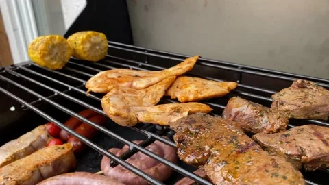 Slow motion slide right close up shot of fresh and juicy meat, kebabs and Stock Footage 136735848