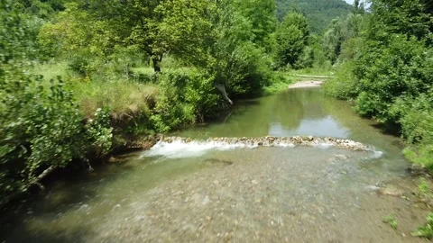 Slow Motion Small Cascade on Pristine River - In Harmony with Nature Stock Footage 329798477
