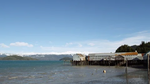 Slow motion of small water waves swinging towards seashore on sunny day Stock Footage 129111614