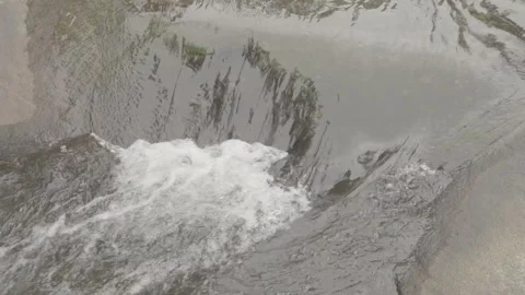 Slow Motion of Small Waterfall/Cascata Flowing Over Rocks in Paraty Stock Footage 320633586