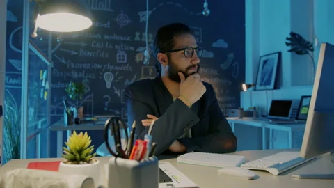 Slow motion of smart businessman finding solution working in office at night Stock Footage 166817706