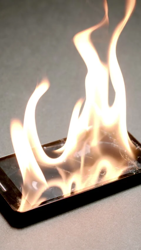 SLOW MOTION: Smartphone burning on a floor Stock Footage 341793824