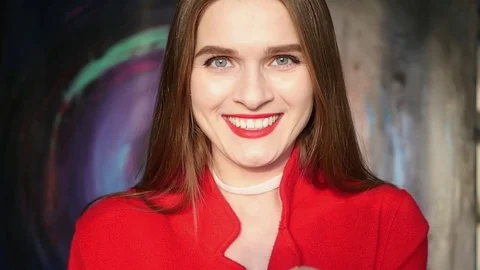 SLOW MOTION. Smiling beautiful young girl with red lipstick, portrait Stock Footage 74087392