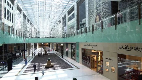 Slow motion smooth shot tracking up through a shopping mall Stock Footage 109182505