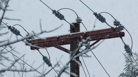 Slow Motion Snow and Ice Blizzard Freezing on Utility and Power Pole Stock-Footage 124389998
