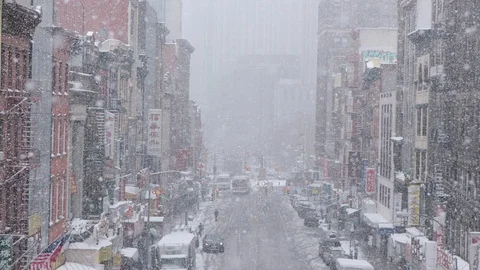 Slow Motion Snow falling onto Manhattan Street Stock Footage 91361328