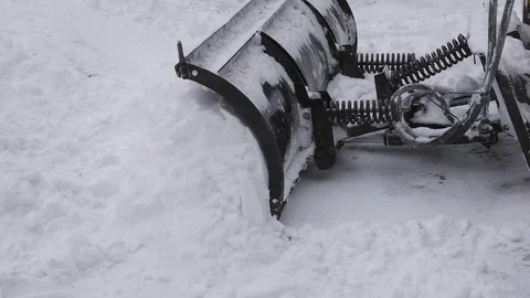 Slow motion snow plow at work. Clearing driveway. Winter in Canada. Stock Footage 103062668